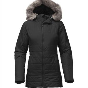 Black puffer coat. North Face